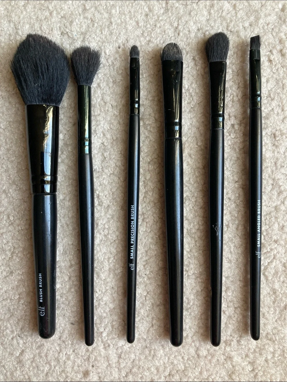 Assorted set of used 11 makeup brushes including Sephora, sonia kashuk and elf